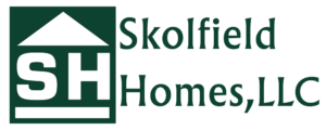 Skolfield Homes Horizontal Logo. Green square with white roofline and floor with the SH between them. The words Skolfield Homes, LLC is to the right of the home image.